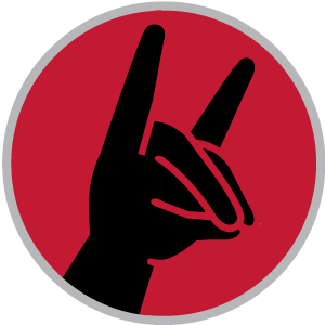Victor E. Huskie demonstrating the Huskie hand gesture